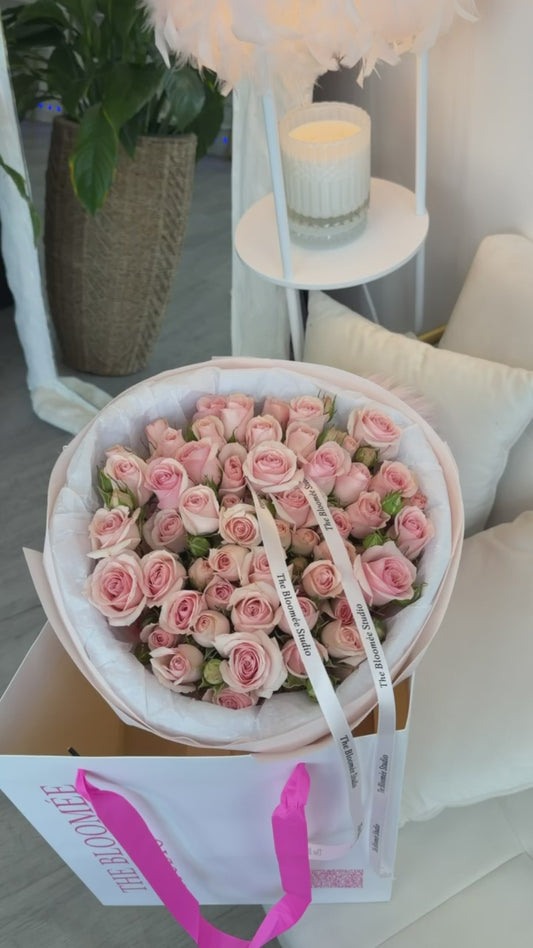 Spray pink rose bouquet